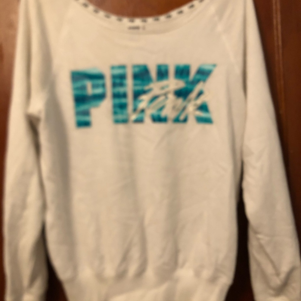 pink off the shoulder light sweatshirt